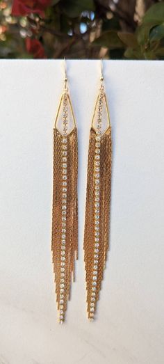 ONE OF A KIND Gold Fringe Earrings - Long Gold Tassel Earrings - Statement Earrings - Rhinestone Chain - Triangle Shaped Gold Jewelry - Xtra Long Fringe - Boho Dangle Gold filled ear wires Stylish, fun, stunning earrings.  Perfect for Vegas, New Years celebrations or a night on the town.  You can wear these lightweight beauties with a vintage tee and jeans or a little black party dress.  Rhinestone chain is made from solid brass, a naturally hypo-allergenic metal, which is electroplated nickel-free.  Tassel - 125x13mm Gold Rhinestone Tassel Dangle Earrings, Gold Tassel Dangle Earrings With Rhinestones, Formal Dangle Jewelry With Rhinestone Fringe, Elegant Dangle Rhinestone Fringe Jewelry, Elegant Metal Earrings With Rhinestone Fringe, Evening Jewelry With Rhinestone Fringe Dangles, Evening Rhinestone Fringe Dangle Jewelry, Gold Earrings With Rhinestone Fringe For Evening, Elegant Gold Earrings With Rhinestone Fringe