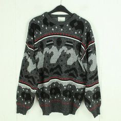 Brand: Vintage Product: Sweater Details: black and white, crazy pattern, 80s, 90s, round neck, knit Size men: L single chest width: 57 cm Arm length: 53 cm simple shoulder width: 62 cm Length: 69cm Condition: very good, used Material: 100% polyacrylic 14 day right of withdrawal | free store pick up in Berlin If you have any questions, please contact us by phone or email. We are happy to help you Monday to Saturday from 12:00 p.m. to 6:00 p.m. Please also note the dimensions as the sizes vary dep Vintage Black Sweater With Graphic Print, Winter Sweater With Graphic Print And Patterned Color, Winter Patterned Sweater With Graphic Print, Patterned Winter Sweater With Graphic Print, Patterned Sweater With Graphic Print For Winter, Black Vintage Sweater With Fair Isle Pattern, Retro Black Sweater With Fair Isle Pattern, Black Crew Neck Sweater With Fair Isle Pattern, Sweater Details