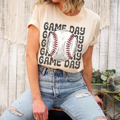 The adorable game day baseball shirt makes a perfect tee for the season. This soft baseball t-shirt is everything you've dreamed of and more. This simply designed shirt makes a great gift for the baseball mom or baseball lover! It feels soft and lightweight, with the right amount of stretch. It's comfortable and flattering for all.  Show off your personality with our fun and unique designs!   ** P R O D U C T   D E T A I L S **  - High Quality, Super Soft and Comfy Bella + Canvas T-Shirt  - 100 % Pre-Shrunk Cotton  (heather colors are polycotton blend)  - Direct to Garment print (no stencils or vinyl which means it will last a lot longer)   - Printed and Shipped in the USA  - Due to different monitor screens colors may vary ** S I Z I N G **  - Consult size chart in listings for measuremen Cotton T-shirt For Baseball Game Day, Game Day Sports Fan Baseball Jersey With Graphic Print, Graphic Print Baseball Jersey For Game Day, Cotton Fan Apparel Baseball Jersey For Game Day, Cotton Baseball Jersey Crew Neck For Game Day, Baseball Jersey With Graphic Print For Game Day, Sports Fan Cotton Baseball Jersey For Game Day, Text Print T-shirt For Baseball Game Day, Cotton Baseball Jersey For Game Day