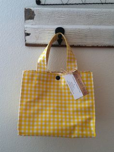 "If you fancy, join bethsmarketbags on instagram for updates, occasional coupons and just plain ol' eye candy! Available in multiple colors and picnic check as well. The base of this bag is 6 1/2\" X 9 1/2\". The height is 8\". The handles measure about 11\" from end to end. If preferred, longer straps can be made to accommodate for over the shoulder. Snap closure(both black and white snaps are available) and an interior pocket that measures about 8x6 inches This bag does a great job standing up Spring Plaid Rectangular Bags, Gingham Bags For Daily Use In Spring, Spring Gingham Bags For Daily Use, Spring Gingham Bag For Daily Use, Square Picnic Bags, Rectangular Gingham Bags For Summer, Summer Plaid Rectangular Bag, Cute Gingham Bags For Gifts, Cute Gingham Rectangular Bags