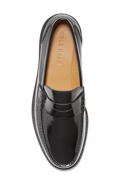 A slim penny slot vamp adds a vintage contrast to this high-polish leather loafer that offers a sophisticated appeal. Moc toe Slip-on style Leather upper, textile lining, rubber sole Imported Black Leather Loafers For Men, Classic Patent Leather Slip-on Loafers, Fitted Moc Toe Loafers For Office, Fitted Patent Leather Loafers With Plain Toe, Classic Slip-on Loafers With Rubber Heel Cap, Classic Black Loafers With Leather Lining, Fitted Patent Leather Loafers With Leather Sole, Fitted Patent Leather Slip-on Loafers, Classic Fitted Patent Leather Loafers