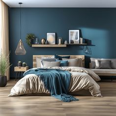 a bedroom with teal walls and wooden flooring is pictured in this image the bed has two pillows on it