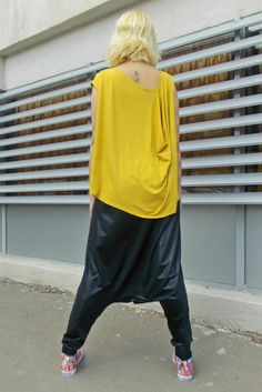 Harem pants, drop crotch pants extremely loose and comfortable, with a touch of punk-glam. Versatile design of drop crotch pants, they can be use both in a street look and a more posh occasion with an elegant, backless top. Material: 50% Viscose, 45% Polyester & 5% Elastane Care instructions: Hand wash at 30 degrees. The top in the picture: https://www.etsy.com/listing/218655923/plus-size-yellow-top-oversize-women The necklace: https://www.etsy.com/listing/228923230/cowhide-leather-necklace- Spring Baggy Drop Crotch Harem Pants, Casual Harem Pants With Drop Crotch, Casual Harem Pants With Drop Crotch And Relaxed Fit, Relaxed Fit Casual Harem Pants With Drop Crotch, Casual Relaxed Fit Harem Pants Drop Crotch, Casual Drop Crotch Pants For Spring, Spring Drop Crotch Relaxed Pants, Spring Drop Crotch Relaxed Fit Pants, Baggy Casual Pants For Alternative Fashion