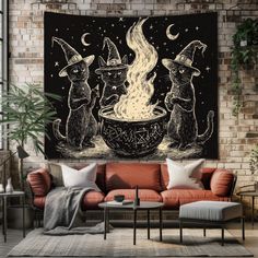 three cats sitting around a fire bowl with witches on it