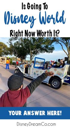 a boy pointing at the disney world sign with text that reads is going to disney world right now worth it? your answer here