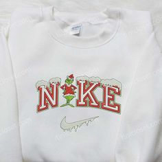 The Nike x Grinch Xmas Embroidered Sweatshirt is the perfect festive attire for the holiday season. Made with high-quality materials, this sweatshirt features intricate embroidery of the iconic Grinch character, adding a touch of whimsy to your wardrobe. The soft and comfortable fabric ensures a cozy fit, while the stylish design allows you to showcase your love for both Nike and the Grinch. Whether you’re attending a Christmas party or lounging at home, this sweatshirt is sure to make a s Jorgen Von Strangle, Nike Cartoon, Nike Inspired, Timmy Turner, Vanellope Von Schweetz, Maroon Hoodie, Embroidered Shirts, Mike Wazowski, Halloween Lovers