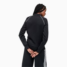 Overview: A SPORTY TRACK JACKET WITH 3-STRIPES STYLE The best of adidas past, remastered for the present. The SST track jacket was originally designed for tennis court warm-ups. This version is made of sleek tricot fabric, which is smooth and slightly shiny on the outside and built with just a bit of stretch for comfortable movement. Features: Regular fit is not tight and not loose, the perfect in-between fit Ribbed SST collar Long sleeves with ribbed cuffs 70% polyester / 25% cotton / 5% elasta Lamb Jacket, Tricot Fabric, Adidas Track Jacket, Adidas Originals Superstar, Adidas Track, Cool Jackets, Track Jacket, Fashion Furniture, Jacket Sale