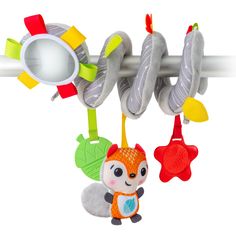 an animal toy hanging from a clothes line with other toys attached to it's hooks