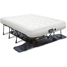 the mattress is attached to a snowboard on top of an inflatable stand