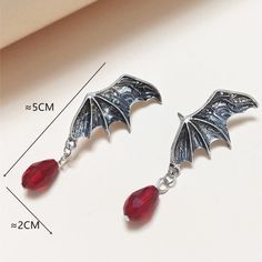 This Unique Pair Is A Wonderful Addition To Your Wardrobe And Your Style; Sure To Get Lots Of Compliments! Great For Halloween Or Anytime! Gsun4e50m00n845 Beaded Stud Earrings, Skull Fire, Boho Drop Earrings, Jewelry Rustic, Moon Studs, Bat Wing, Tassel Drop Earrings, Rustic Jewelry, Rudolph The Red