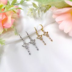 "This listing is for a pair of rhodium or gold plated heart wand charm earrings with cubic zirconia accents and mini huggie hoops. Great for sensitive ears! Earrings are about 1.5\" in total length." Heart Wand, Angel Heart, Jewelry Earrings Hoops, Charm Earrings, Baguette, Cross Necklace, Cubic Zirconia, Gold Plate, Jewelry Earrings