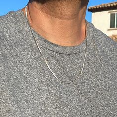 Men's and women's tennis chain necklace. Real genuine solid 925 sterling silver chain. Choose 16"-22", chain measures 2MM thick Authentic D Color VVS1 moissanite stones. Second hardest to diamonds on the Mohs scale. M 925 is stamped on the single latch clasp. Pass a diamond tester pen (as shown in photo) Shows up as moissanite (not diamond) on lab assays. Weigh approx. 13-16 grams depending on length. Won't change color or ever turn your skin green. Look like $3000-$8000 diamond tennis chains. E Silver Minimalist Tennis Necklace For Everyday Wear, Minimalist Silver Tennis Necklace For Everyday, Everyday Silver Minimalist Tennis Necklace, Everyday Minimalist Silver Tennis Necklace, Minimalist Silver Tennis Necklace With Diamond Cut, Minimalist Silver Diamond Cut Tennis Necklace, Silver Minimalist Tennis Necklace For Anniversary, Minimalist Silver Tennis Necklace For Anniversary, Classic Silver Tennis Necklace For Everyday