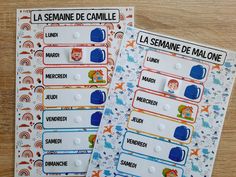 two matching game cards with french words and pictures on them, sitting on a wooden surface