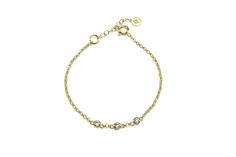 Adorn your wrist with this minimalist bracelet, artfully crafted with a 14k gold chain and adorned with three sparkling cubic zirconia stones. This dainty, delicate piece is the perfect accessory for everyday wear, offering a touch of elegance and sophistication to any outfit. It would make a perfect gift for mom, or a special treat for yourself. Cherish this high-quality, durable bracelet that is sure to become a favorite in your jewelry collection. Three cubic zirconia stones Minimalist 14k gold chain bracelet Dainty and delicate design Elegant and sophisticated accessory Beautiful addition to any jewelry collection Product specifications Jewelry Information Metal stamp 14K Metal Gold Filled Gem Type Cubic Zirconia Setting Bezel Resizable No Stone Information Stone shape Round Shape Mini Gold Chain Bracelet, Bracelet Dainty, Delicate Design, Minimalist Bracelet, Gold Bracelet Chain, Perfect Gift For Mom, Metal Stamping, Gift For Mom, Gold Vermeil