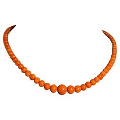 Fine & Rare Orangey Red Coral Bead Necklace Composed of 53 natural coral beads of approximately 4.2 to 13 mm., of stunning red to orangey red colour completed by a clasp set with oval cabochon natural coral of 4.5mm x 9.9mm within 18K yellow gold frame/setting Total length of the necklace: 58.5cm or 23 inches Total item’s weight: 33.6gr. In beautiful condition Accompanied by valuation report Coral Beads Necklace, Pinkish Red, Coral And Gold, Natural Coral, Red Colour, Coral Beads, Red Coral, Oval Cabochon, Bead Necklace