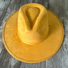 Beautiful Suede Fedora Hat Mustard! This Hat Its A Beauty!! The Color And Style Just Perfect! My Favorite Color! New, It Was A Gift From My Mother But Doesnt Fit Me. Big For Me. Size: Medium Made In Mexico Color: Mustard Yellow Fitted Fedora With Flat Brim, Yellow Fitted Fedora With Curved Brim, Fitted Yellow Fedora With Curved Brim, Yellow Fedora With Short Brim, Yellow Fitted Fedora With Short Brim, Classic Yellow Hat With Short Brim, Yellow Wide Brim Fedora, Western Style Gold Fedora With Flat Brim, Fitted Yellow Hat For Fall