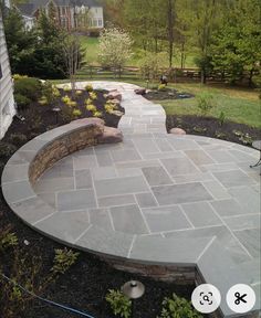 Circular Flagstone Patio, Backyard Paver Sitting Area, Mortared Flagstone Patio, Gray Stone Patio, Interlocking Stone Patio, Stamped Concrete Front Walkway, Circular Stone Fire Pit, Round Stamped Concrete Patio, Flagstone Patio With Retaining Wall