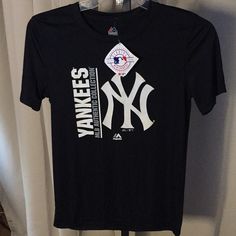 a yankees t - shirt hanging on a hanger