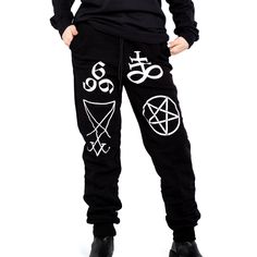 Unisex "Jogger" Style Sweatpants from Forbidden Alchemy. Designed for both comfort and style, these slim-fitting joggers feature a tapered ankle for a sleek silhouette that flatters all body types. Crafted from a premium blend of 80% cotton and 20% polyester, they offer the perfect balance of softness and durability, ensuring all-day comfort and long-lasting wear. Slim Fit: Tailored to hug your body while allowing ease of movement. Tapered Ankle: Provides a modern, streamlined look. Premium Fabr Style Sweatpants, Gothic Clothing, Gothic Aesthetic, Black Joggers, Fashion Joggers, Alchemy, Body Types, Clothing Brand, Sweatpants