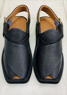 *This prized craft from Pakistan showcases the skill of South Asian artisans and utilizes the finest quality leather. This Jet-Black Leather Peshawari shoes not only elevates your style but also becomes a statement piece, enhancing your presence in any setting. Crafted with an additional sole for added comfort, our skilled artisans ensure precision and finesse in every stitch. *These exquisite handcrafted Black Peshawari Chappals are often referred to as Kaptaan Chappals or Imran Khan Chappals, Leather Sandals For Galas With Single Toe Strap, Leather Closed Toe Sandals For Galas, Formal Open Toe Leather Shoes, Traditional Formal Leather Shoes With Rubber Sole, Formal Closed Toe Sandals With Stitched Sole, Traditional Leather Shoes With Round Toe For Formal Occasions, Traditional Round Toe Leather Shoes For Formal Occasions, Festival Closed Toe Sandals With Leather Sole, Closed Toe Sandals With Leather Sole For Festivals