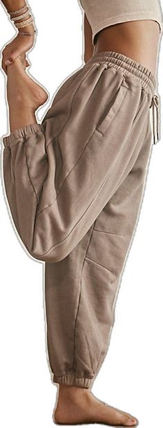 Fall Joggers With Drawstring And Loose Fit, Sporty Pull-on Sweatpants For Fall, Baggy Joggers With Elastic Waistband For Fall, Baggy Sporty Sweatpants For Fall, Sporty Baggy Sweatpants For Fall, Athleisure Sweatpants With Pockets For Fall, Sporty Joggers With Loosely Fitted Hips For Fall, Fall Athleisure Sweatpants With Pockets, Loosely Fitted Joggers For Leisure In Fall