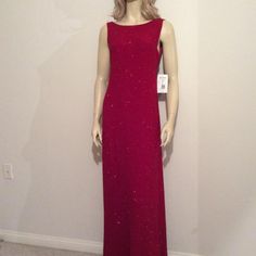 Bright Red Floor Length Gown With Sparkles Overall; Shimmery, Sexy, Shapely & Sleeveless ; Deep Scoop Back; Perfect For A Formal Night Out; Comfortable. 10%Spandex; 58"Length & 13" Shoulders. Nwt; Size 12 Sleeveless Sequin Gown For Red Carpet, Fitted Embellished Red Maxi Dress, Red Embellished Fitted Maxi Dress, Fitted Red Embellished Maxi Dress, Embellished Red Maxi Dress, Red Embellished Floor-length Maxi Dress, Sleeveless Embellished Dress For Red Carpet, Red Fitted Gown For Party Season, Embellished Sleeveless Dress For Red Carpet