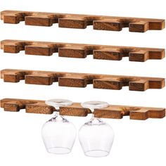 three wine glasses are hanging on the wall with wooden shelves in front of each other