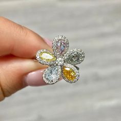 3.01 Total Carat Weight -ALL WEIGHTS APPROXIMATE 0.50 Carat GIA Fancy Vivid Orange-Yellow VS2 Pear 0.39 Carat GIA Very Light Green VS1 Pear 0.41 Carat GIA Fancy Yellow VS1 Pear 0.56 Carat GIA Fancy Light Purplish Pink SI2 Pear Set in Platinum Handmade Ready in 3-4 Weels Luxury Multi-stone Yellow Diamond Ring, Formal Yellow Multi-stone Diamond Ring, Yellow Diamond Platinum Ring With Center Stone, Yellow Platinum Diamond Ring, Yellow Platinum Diamond Ring Fine Jewelry, Yellow Platinum Diamond Ring Gift, Fine Jewelry Yellow Diamond Platinum Ring, Yellow Platinum Diamond Ring With Halo Setting, Yellow Multi-stone Diamond Ring Fine Jewelry