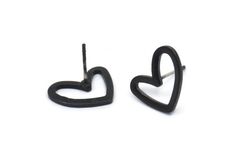 Oxidized Black Brass Heart Stud Earrings Material : Brass Size : 11x14x1mm Quantity : 8 Pieces For More Silver Plated Please See Here : https://www.etsy.com/shop/yakutum?ref=simple-shop-header-name&listing_id=240593425&section_id=22909191 For More Earring Findings Please See Here : https://www.etsy.com/shop/yakutum?ref=simple-shop-header-name&listing_id=240593425&section_id=20270809 For More Yakutum Jewelries Please See Here : https://www.etsy.com/shop/yakutum?ref=simple-shop-header-name&listing_id=240593425 Enjoy! Black Metal Heart Earrings For Party, Heart-shaped Black Earrings, Gothic Black Heart-shaped Earrings, Valentine's Day Heart-shaped Black Enamel Jewelry, Black Heart Earrings, Heart Studs, Black And Brass, Heart Earrings Studs, Gold And Silver