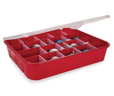 a red plastic container filled with lots of balls