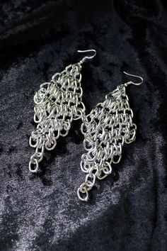 "These statement chainmail earrings are big but pretty lightweight for their size - they are made of aluminum. Shiny and bouncy - lots of fun. DIMENSIONS: 4 3/16\" (10.6 cm) long (from the top of the hook to the bottom of the earring), 1 3/8\" (3.5 cm) wide WEIGHT: 12 g (0.4 oz) each The earrings come with your choice of ear wires. The last photo will help you figure out which ear wire type you want. Some ear wire options are made of sterling silver, others are just a base metal alloy, which is Nickel Free Silver Chandelier Earrings For Festivals, Nickel-free Silver Chandelier Earrings For Festivals, Silver Metal Chandelier Earrings For Festivals, Metal Chain Chandelier Earrings, Bohemian Chainmail Metal Jewelry, Silver Chain Earrings For Party, Nickel-free Silver Metal Chandelier Earrings, Silver Metal Chandelier Earrings For Party, Silver Chainmail Metal Jewelry