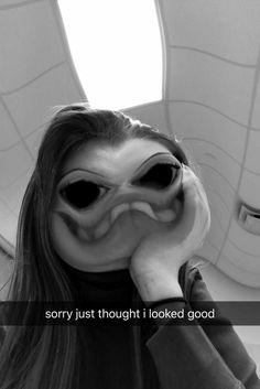 a woman wearing an alien mask with the caption sorry just thought i looked good