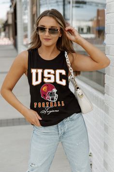 Introducing the USC Trojans Preseason Opener Racerback Tank Top! Designed for performance and style, this tank top is made from high-quality materials to keep you cool and comfortable during any workout. Show your team spirit while looking and feeling your best. Perfect for any USC Trojans fan!