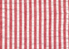 the red and white striped fabric is very close to it's surface, with small stripes