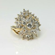 14K Yellow Gold 3ct Diamond Domed Cocktail Ring, H color - VS/SI clarity, 4.25mm center rounds to one side, marquise to other half almost pear shaped top, on bypass band split shank open wire work support, 7/8 inch across, 1/2 inch above finger, 5 tiers, 31 round diamonds, 11 marquise diamonds, Ring size 7.25, Circa 1960, 6.9 grams SKU# BB286R25 This listing contains photographs of the actual item you will receive. Our items are in excellent condition with little or no signs of wear and many are Gold Coin Ring, Jewelry Girl, Diamonds Ring, Coin Ring, Split Shank, Marquise Diamond, Fine Jewelry Designers, Pretty Rings, Wire Work