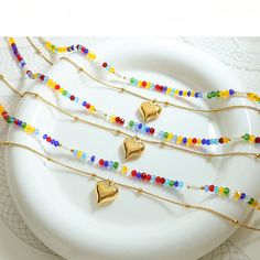 Style: Female Material: Titanium Steel, Imitation Pearl, Crystal Beads Pearl Type: Uncultured Pearl Color: White Necklace Length: 40 / 46)+5cm Heart Pendant:1.3*1.5cm Gold Heart Pendant, Stacked Necklaces, Heart Pendant Gold, Rainbow Crystal, Pearl Crystal, White Necklace, Pearl Types, Pearl Color, Gold Heart