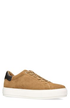 Soft suede wraps the minimalist silhouette of this dapper sneaker finished with a contrast heel accent and classic rubber cupsole. Leather upper/synthetic lining/rubber sole Imported Pastel Brown, Tan Sneakers, Tan Guys, Suede Fashion, Brown Sneakers, Tan Suede, Kurt Geiger, Logo Stamp, Soft Suede