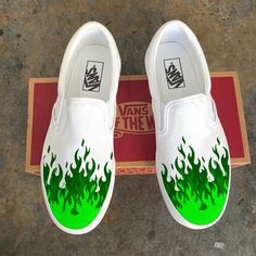 Forerst green, bright green, and neon green flame fire tip Slip On Vans Shoes. We buy each pair of shoes BRAND NEW. Each pair is made to order, please make sure you put in the correct shoe size before you check out. The ink is permanent and will never come off, fade away, or peel off. Made in the USA. This price includes everything: shoes, artwork, and shipping. Thanks for stopping by our Etsy shop! Please message me with any questions! Because the artwork is custom made for you, there are no ex Green Custom Shoes, Shoes Art, Custom Painted Shoes Ideas, White Slip On Shoes, Custom Vans Shoes, Painted Shoes Diy, Custom Sneakers Diy, Vans White