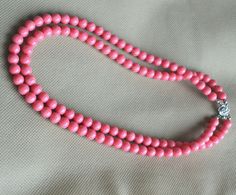 I make the necklace to use 8mm pink coral color glass bead.The necklace length is 18 inches.( If you need the other length ,You can leave a note in the order.) IT is good necklace for your great wedding. I can make different type necklace to your requirements,Please feel free to contact me if you have any question. Thank you so much. . Matching stud earrings: https://www.etsy.com/listing/229587890/pink-coral-earringsglass-pearl?ref=listing-shop-header-1 matching dangle earrings https://www.etsy. Elegant Pink Beaded Necklaces With 8mm Beads, Elegant Pink Beaded Necklace With 8mm Beads, Elegant Pink Necklaces With 8mm Beads, Good Necklace, Coral Beads Necklace, Coral Necklace, Necklace Wedding, Necklace Statement, Pink Coral