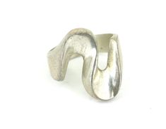 Vintage Mexico Squiggle Waved Design Ring 925 Sterling Silver RG 1619 Condition: Vintage  Metal: Sterling (.925) Silver  Weight: 10.7 grams  Size: 8.75 in   Width : 22.72 mm Images you see are actual pictures of jewelry you will receive Every purchase comes thoughtfully packaged and ships within 1 business day  New York State buyer will be charged sales tax Feel free to contact us with any questions.  We are open Mon-Fri 9-5 EST  We appreciate your business  View more great items Modern Silver Wavy Rings, Marquise Cut Rings, Vintage Mexico, Feather Ring, Swirl Ring, Casting Jewelry, Funky Jewelry, Pawn Shop, Hand Picked