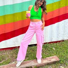 The Pants That Go With Everything. Our Baby Pink Cargos Are The Perfect Mix Of Cool-Girl And Girlie Style. You Will Love These For Their Flattering High-Waisted Fit, Cool Pockets, And Soft Pink Color. We Paired Ours With The Ombre Rainbow Mesh Top. The Coolest Cargos Around Soft Baby Pink Color They Have Pockets Flattering High-Waisted Fit Some Stretch Cool Girl Energy Incoming... True To Size 97% Cotton 3%Spandex Kalianna Is 5'7 Wearing A Size Small And Typically Wears A Size Small. Haley Is 5' Y2k Style Cotton Pants For Spring, High Waist Green Cargo Pants Y2k Style, Trendy Pink Parachute Pants For Spring, Trendy Pink Cargo Pants For Summer, Pink High-waisted Cotton Parachute Pants, Trendy Pink Cotton Parachute Pants, Y2k High-waisted Cotton Bottoms, Y2k High-waisted Cotton Pants, Trendy Pink Cargo Pants For Spring