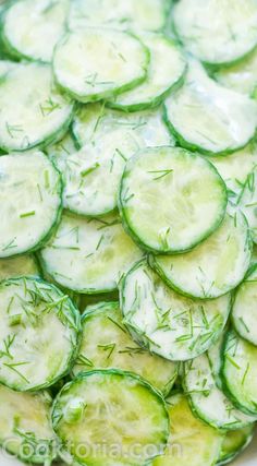 cucumber slices are arranged in a bowl