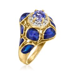 Ross-Simons - C. 1980 Vintage .50ct Tanzanite, Blue Enamel Ring, .12ct t. w. Diamonds. Size 6.25. C. 1980. Here's a cocktail ring bound to take your breath away! A very special addition to our Estate collection, the eye-catching design presents a .50 carat round tanzanite, haloed by .12 ct. t. w. round diamonds in 18kt white gold, inside a contemporary band comprised of bright blue enamel spots. Crafted in 18kt yellow gold. 5/8" wide. Blue enamel and tanzanite cocktail ring. Exclusive, one-of-a- Fine Jewelry Enamel Multi-stone Ring For Anniversary, Fine Jewelry Blue Enamel Anniversary Ring, Fine Jewelry Enamel Ring With 17 Jewels For Anniversary, Tanzanite Jewelry, Vintage Cocktail Ring, Enamel Ring, Gem Stone, Cocktail Ring, Cocktail Rings