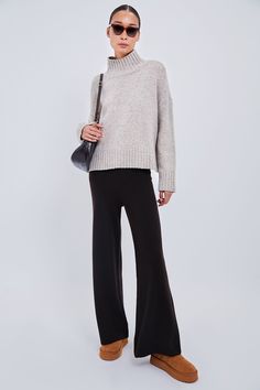 Cozy Comfort Meets Effortless StyleCrafted in the brand's signature luxe cashmere blend, the Zoe Pant is a truly versatile pull-on style knit pant with a relaxed leg silhouette and a wide, ribbed elastic waistband. Lounge in these at home, then throw on your favorite pull-over and loafers to step out.Our Favorite Details: Elastic waistband Pull-on style Relaxed fit Wide leg silhouette Material: 25% Cashmere, 45% Superfine Lambswool, 30% ViscoseCare: Dry cleanAbout the BrandFounded in Los Angeles Cozy Cashmere Bottoms For Winter, Chic Wide Leg Pants With Ribbed Waistband For Fall, Cozy Cashmere Bottoms For Fall, Chic Cashmere Pants For Fall, Chic Cashmere Winter Bottoms, Chic Winter Cashmere Bottoms, Elegant Wide Leg Pants For Winter Loungewear, Elegant Ribbed Pants For Fall, Fall Wool Pants For Loungewear