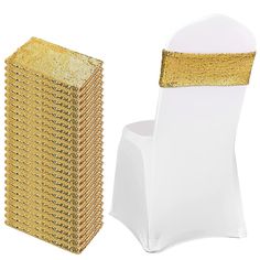 a white chair with gold sequins on the back and seat cover next to it