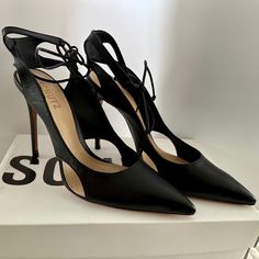 Size 8.5 Sharon Cutout Leather Ankle-Tie Pumps In Black Leather. Also Has Side Cutouts To The Stiletto Pump Topped With A Slim Ankle Strap. Heel Is About 4'' - 5 '' Inches. Brand New ! Never Been Worn ! Comes With Original Box And Original Schutz Dust Bag. Chic Evening Heels With Ankle Tie, Chic Ankle Tie Heels For Evening, Chic Ankle Tie Heels For Night Out, Leather Heels With Ankle Tie And Heel Strap, Leather Heels With Heel Strap And Ankle Tie, Formal Leather Heels With Ankle Tie, Leather Lace-up Party Heels, Spring Ankle Tie Leather Heels, Leather Heels With 4-inch Heel For Date Night