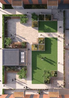 an aerial view of a park with benches and grass