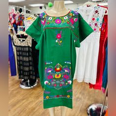 A Favorite Mexican Dress For Generations! Great For Weddings, Baby Showers, Bridal Showers, And Many Other Mexican Themed Events! New, Handmade Midi Dress, Floral Embroidery Made By Hand 100% By Native Artisans From Puebla, Mexico. Made With Poplin Fabric And Multicolor Cotros Threads. The Photos Are A Representation Of The Item You’ll Receive Not The Exact Same One, The Embroidery Patterns And Colors Will Be Always Different, Every Dress Is One Of A Kind. Traditional Green Spring Dress, Green Embroidered Short Sleeve Dresses, Fitted Wedding Dress For Fiesta, Traditional Wedding Dress For Fiesta, Traditional Short Sleeve Dress For Fiesta, Green Summer Dress For Fiesta, Green Spring Fiesta Dress, Spring Fiesta Green Dress, Green Plus Size Dresses