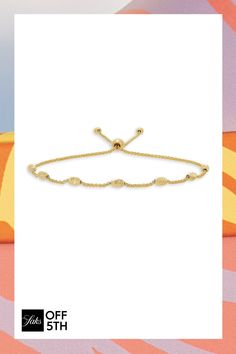 Bohemian In Essence, This Delicate Wheat Chain Bracelet Flaunts A Utilitarian Bolo Design. 14k Yellow Gold Bolo Clasp Imported Size Length, About 8.25"-8.75". Center Core - W Fine Jewelry > Saks Off 5th > Barneys Warehouse. Saks Fifth Avenue. Adjustable 14k Gold Bracelet With Gold Beads, Gold Beaded Bracelets With Adjustable Chain, Yellow Gold Beaded Bracelets With Adjustable Chain, Adjustable Gold Beaded Chain Bracelet, Adjustable Gold Bracelet With Beaded Chain, Adjustable Yellow Gold Hand-strung Bracelet, Gold-tone Jewelry With Gold Beads, Adjustable Yellow Gold Beaded Bracelet, Yellow Gold Bracelets With Adjustable Chain