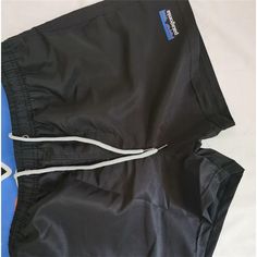 Men's Elastic Waist Quick-drying Shorts - Blue Force Sports Black Pocketed Shorts For Beach Season, Black Beach Shorts With Pockets, Black Athletic Shorts For Summer Outdoor, Black Nylon Shorts For Beach Season, Black Stretch Swim Trunks, Black Stretch Swim Trunks For Outdoor, Black Beachwear Shorts For Outdoor, Black Beach Shorts For Outdoor, Black Shorts For Swimming With Short Leg